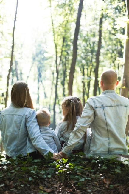 Family sitting for a photoshoot