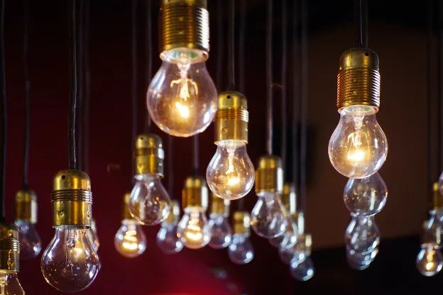  Vintage-style light bulbs hanging upside down—illustrates testing and replacing lights in your RV electrical system.
