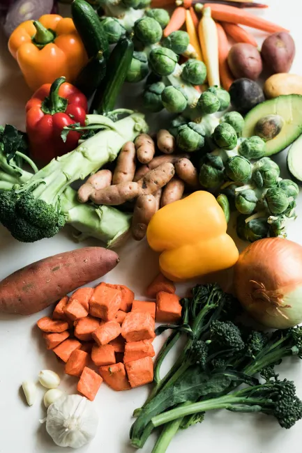  Colorful assortment of fresh fruits and vegetables representing the healthy eating habits embraced in full-time RV life.

