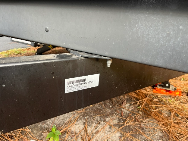  Stamped VIN number located on the trailer tongue of an RV—often found on older campers and travel trailers.

