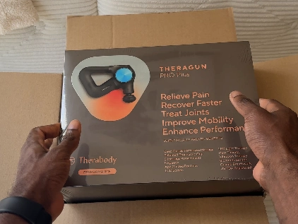 Unboxing the Theragun PRO Plus multi-therapy massage device.