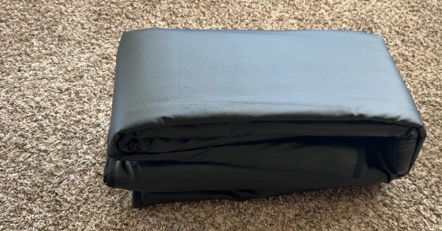 HigherDose infrared sauna blanket folded neatly for travel or storage.