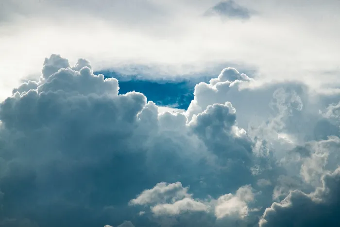 clouds and air mattress on a plane