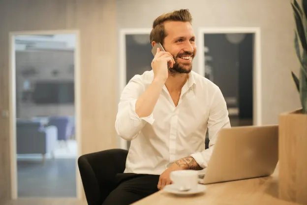 happy guy with a computer