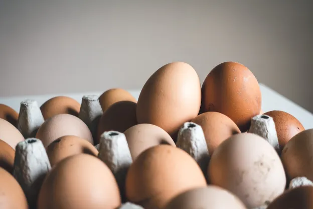 whole eggs in an open carton