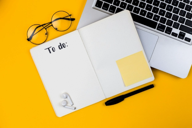 Open to-do list notebook symbolising organisation, productivity and tasks to outsource to a virtual assistant.