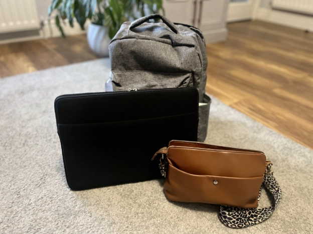 Laptop, laptop sleeve and bags packed for jury service