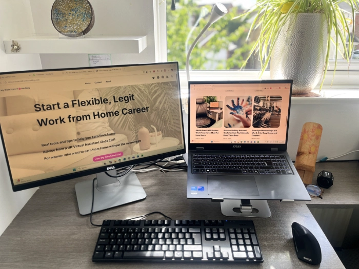 Dual monitor setup with laptop stand in a work from home office