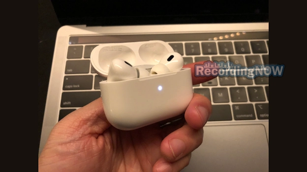 AirPods Pro 2 in Bluetooth pairing mode with white light on charging case