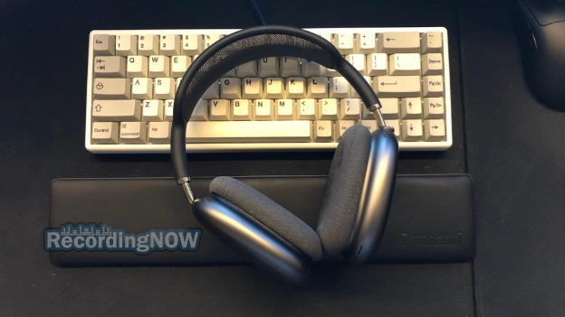 Apple AirPods Max in space grey on office desk