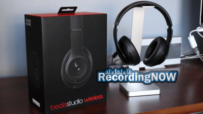 Beats Studio 2 Wireless on headphone stand next to box