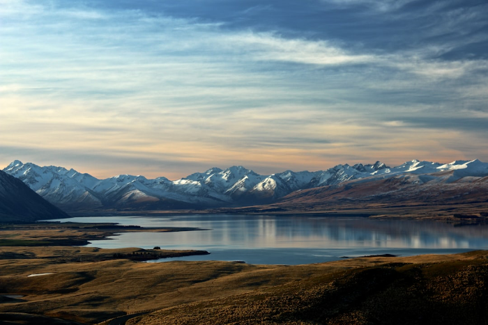 Lake with mountains in the background