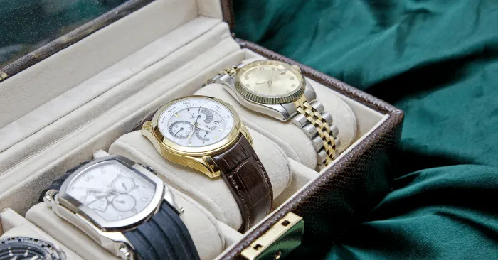 Image of different types of watches in a watch case